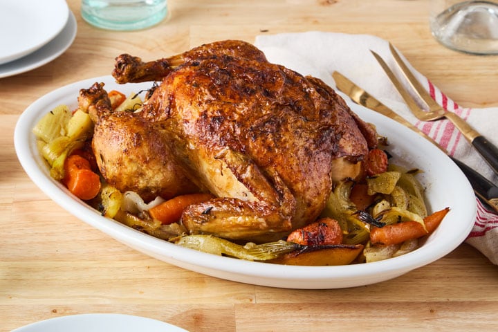 Roast chicken with vegetables on platter