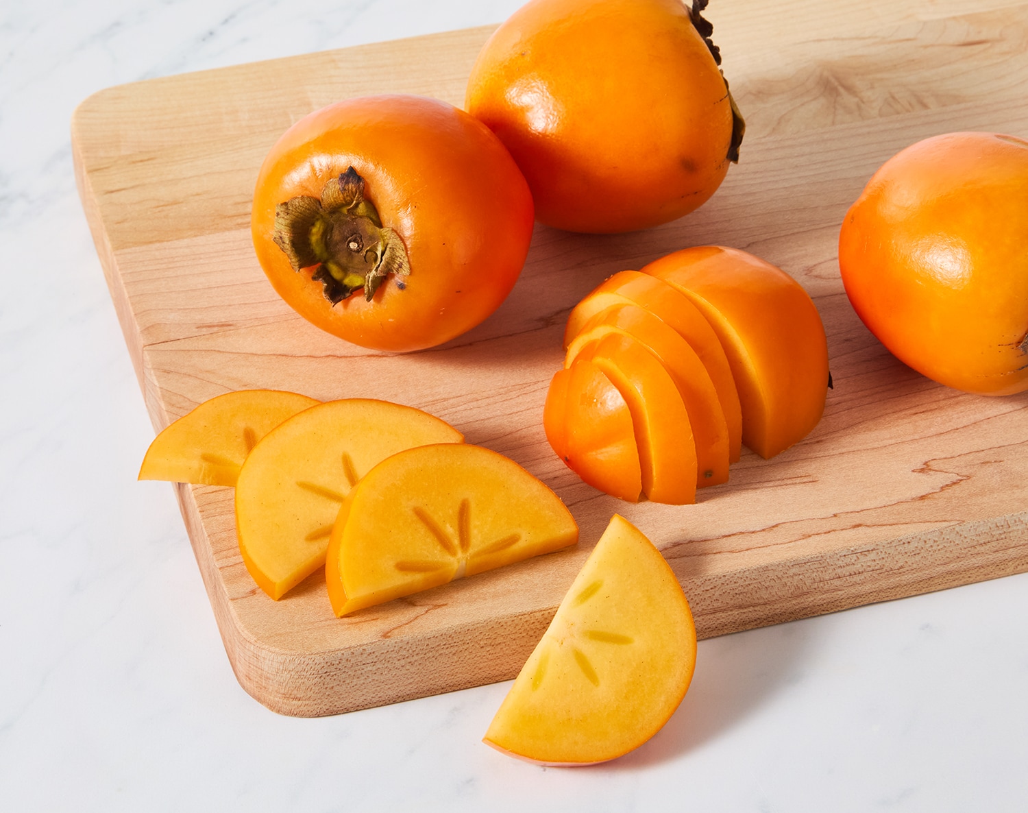 Kaki Persimmons, image 2 of 2 slides