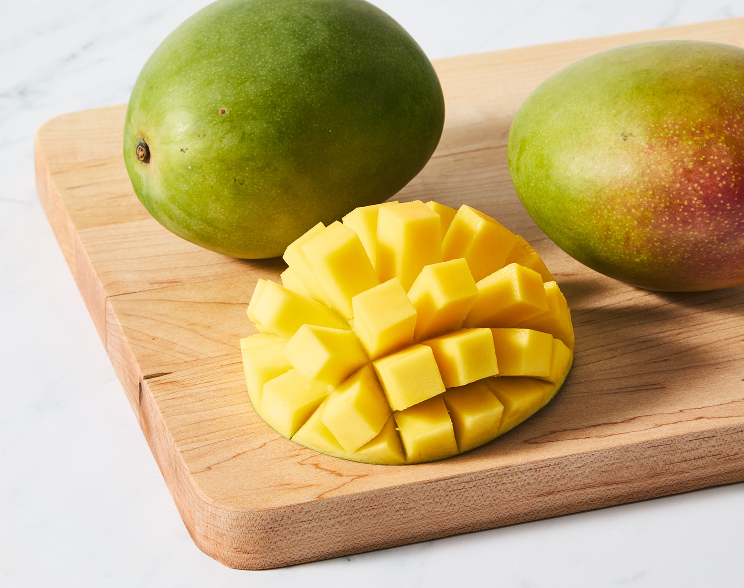 Kent Mango, image 2 of 2 slides