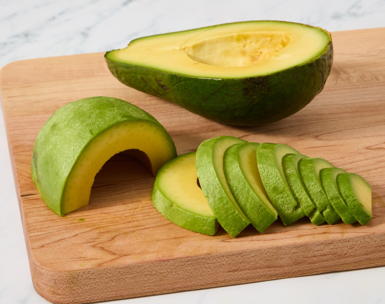 Green-Skinned Avocado, Firm, Large, image 2 of 2 slides